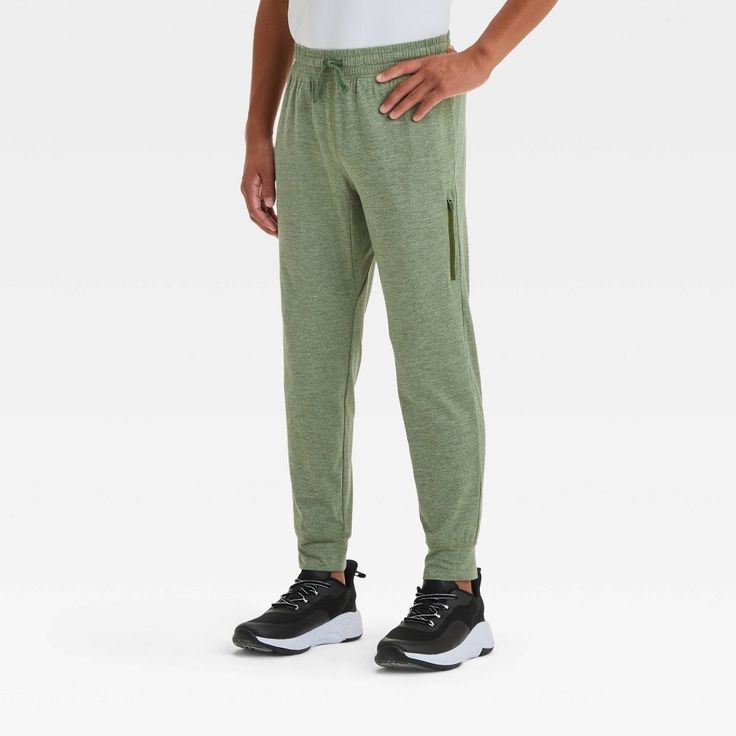 Why we're ALL IN: Gym jogger pants crafted from extra-lightweight recycled polyester with spandex. Equipped with moisture-wicking and quick-drying properties to keep your child feeling cool and fresh during any activity. Sport an adjustable waistband with a drawcord. Tailored in a regular-fit silhouette with banded ankles. Side pockets and a zippered pocket on leg complete the design. All in Motion™: Made for every move, priced for every day. Casual Pants With Pockets In Recycled Polyester, Athleisure Cotton Sweatpants For Outdoor Activities, Casual Recycled Polyester Pants For Outdoor Activities, Recycled Polyester Casual Pants For Outdoor Activities, Recycled Polyester Casual Pants For Outdoor, Eco-friendly Casual Pants For Outdoor Activities, Green Sweatpants With Elastic Waistband For Outdoor, Green Breathable Casual Pants, Casual Green Activewear For Jogging