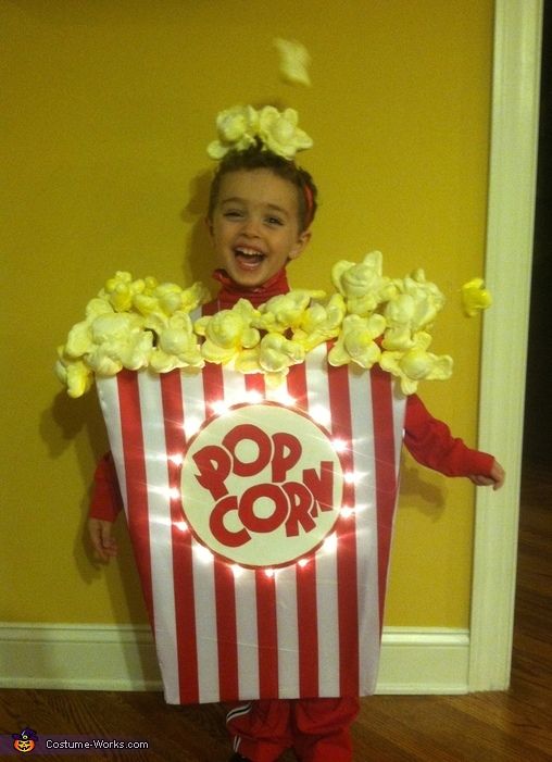 a child in a popcorn box costume