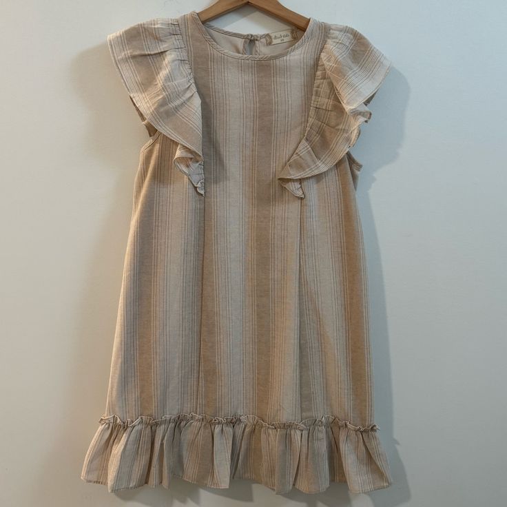 Nwot Hits A Palm Above The Knee For Me And I’m 5.2” So I’d Say This Is More Of A Mini Dress, Very Cute And Linen Like Material Beige Sleeveless Ruffle Dress For Summer, Elegant Beige Sleeveless Dress With Ruffles, A-line Sleeveless Dress With Ruffles For Daywear, Beige Ruffled Short Sleeve Mini Dress, Beige Short Sleeve Mini Dress With Ruffles, Beige Mini Dress With Ruffles And Short Sleeves, Beige Knee-length Dresses With Ruffles, Beige Ruffle Hem Dress For Daywear, Beige Flutter Sleeve Dress For Summer