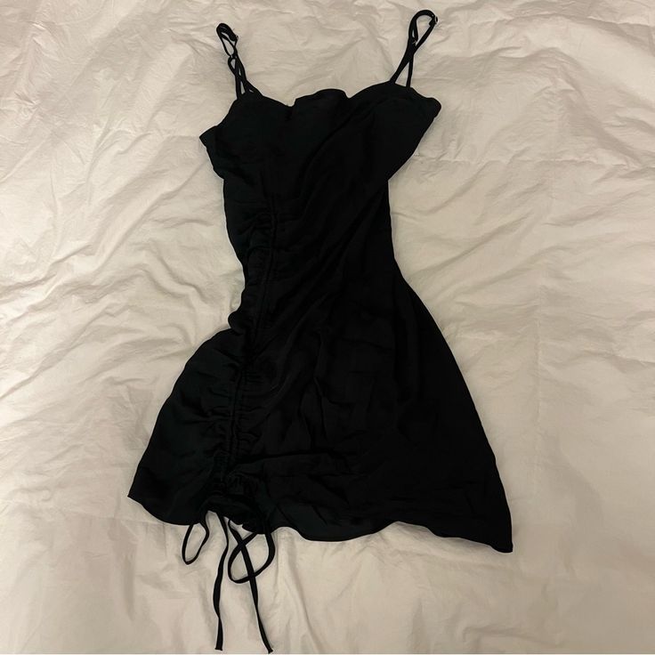 Size Small! Nwot! Free People Dress With Adjustable Tied Ruching Chic Fitted Dress With Side Ties, Casual Tie Straps Dress For Party, Casual Party Dress With Tie Straps, Casual Black Dress With Drawstring, Black Casual Dress With Drawstring, Black Fitted Mini Dress With Drawstring, Fitted Black Mini Dress With Drawstring, Chic Drawstring Mini Dress For Brunch, Chic Brunch Mini Dress With Drawstring