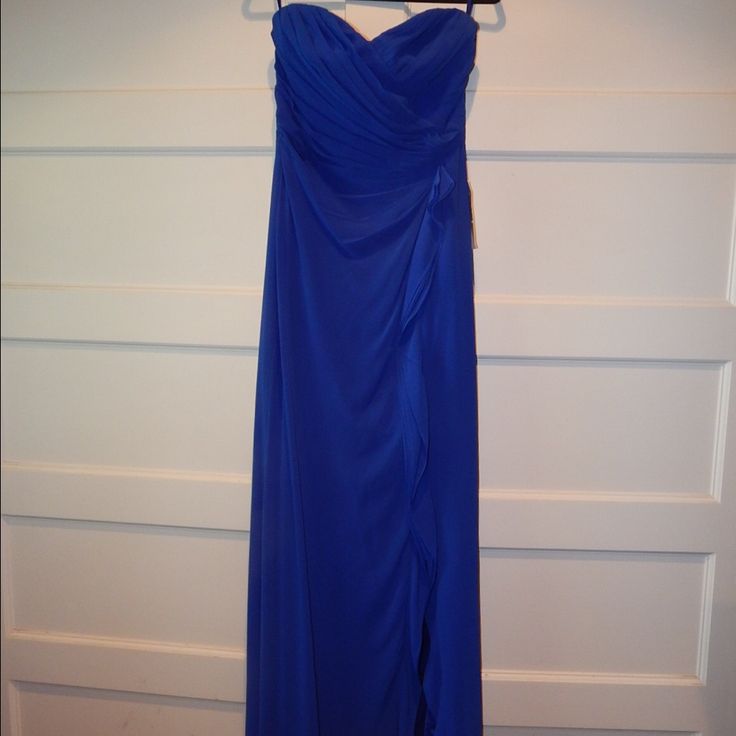 Beautiful Blue Strapless Ralph Lauren Gown Brand New Never Been Worn Tags On! Blue Strapless Evening Dress With Sweep Train, Blue Strapless Evening Dress For Formal Occasions, Formal Blue Strapless Evening Dress, Blue Floor-length Strapless Formal Dress, Blue Floor-length Strapless Dress For Formal Occasions, Blue Strapless Floor-length Dress For Formal Occasions, Blue Floor-length Strapless Dress For Prom, Formal Blue Floor-length Strapless Dress, Blue Strapless Evening Dress With Ruched Bodice