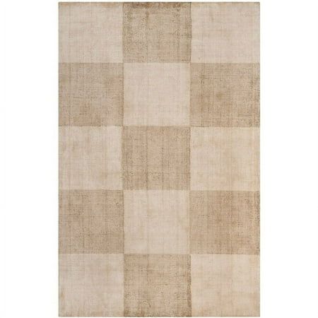 a beige rug with checkered squares on the bottom, and an off white background