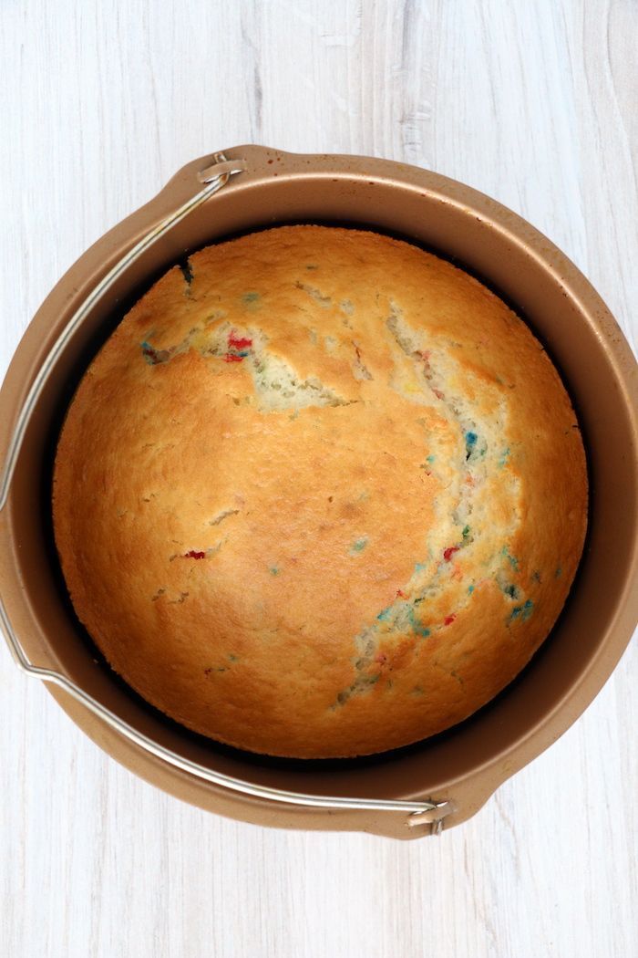 a loaf of bread sitting in a pan on top of a table