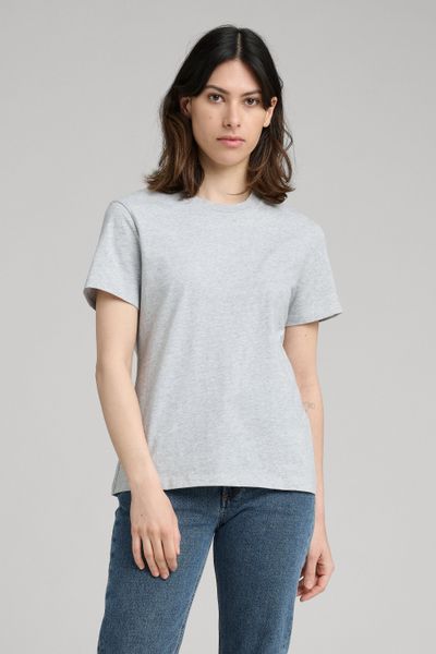 Cemented as the #1 womens’ essential by Jane Birkin in the 60's and 70's, The T-Shirt is the natural starting place for our growing permanent collection of women's essentials. Developed for longevity, both aesthetically and physically, our T-Shirt is made from a soft yet substantial mid-weight organic cotton jersey, designed to feel light without being frail or see-through. It's cut to a classic fit and accentuated with a slightly elevated, neatly ribbed neckline. Tuck it into a skirt, or make i Classic Crew Neck T-shirt For Everyday, Simple Organic Cotton Short Sleeve T-shirt, Classic Plain T-shirt With Relaxed Fit, Classic Relaxed Fit Plain T-shirt, Minimalist Relaxed Fit T-shirt, Heather Grey Cotton Short Sleeve T-shirt, Simple Organic Cotton Tops With Relaxed Fit, Classic Gray Crew Neck T-shirt, Relaxed Fit Minimalist Tops In Organic Cotton