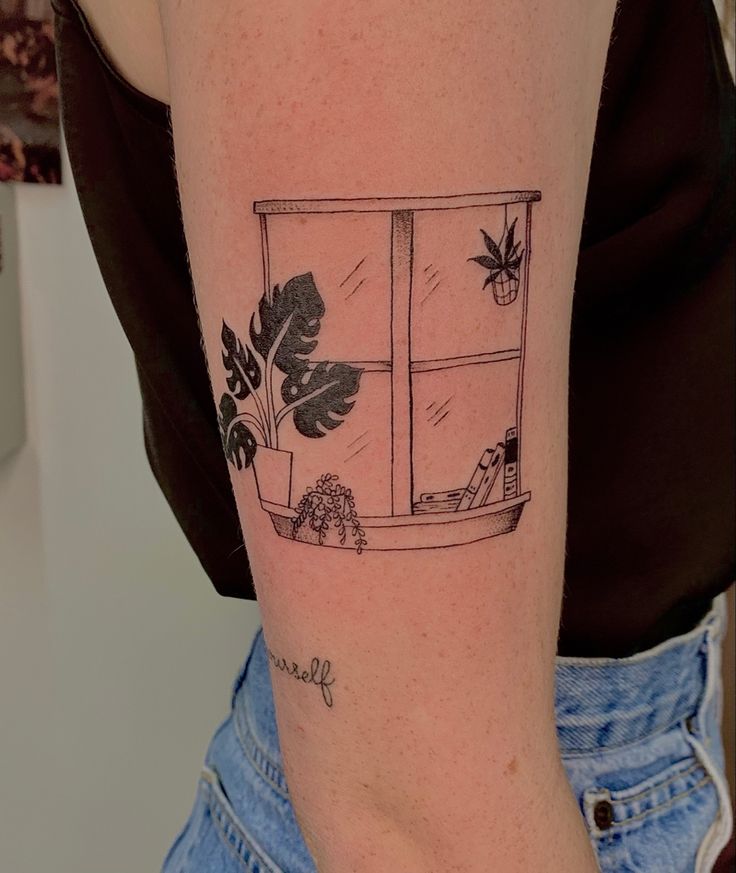 a woman with a tattoo on her arm has a window and potted plants in it