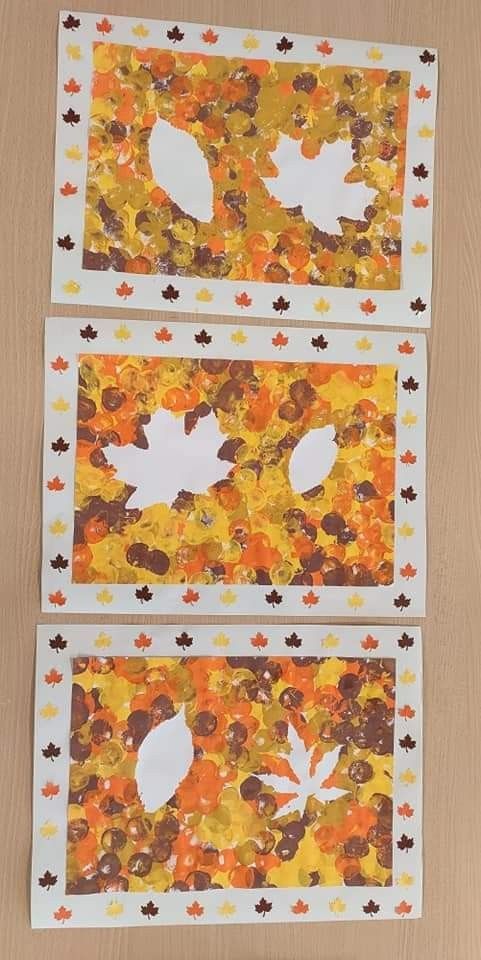 three pieces of paper cut out to look like fall leaves