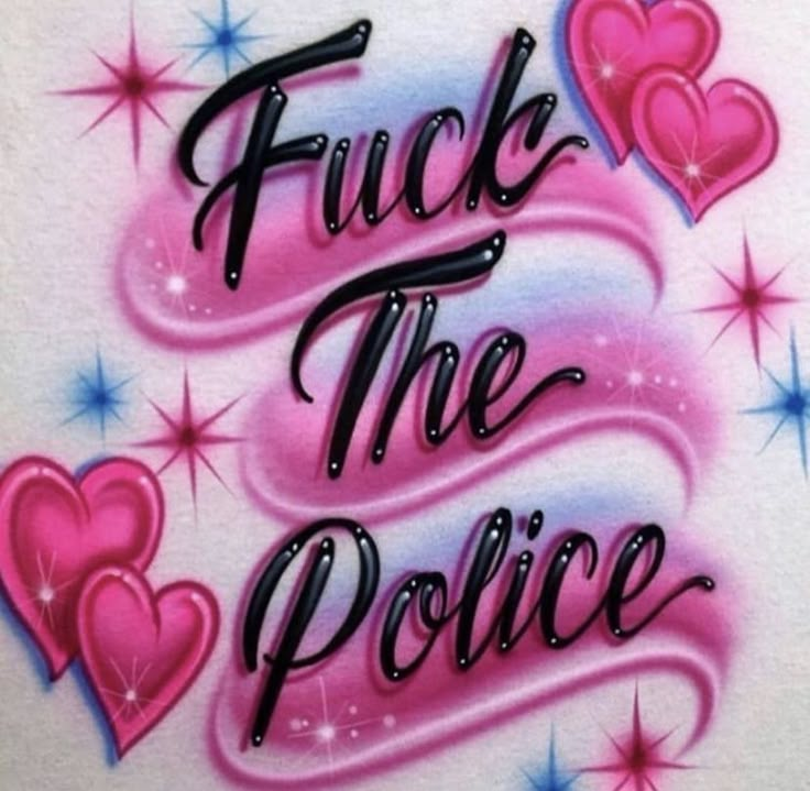 some pink and blue hearts with the words f k the police on it's chest