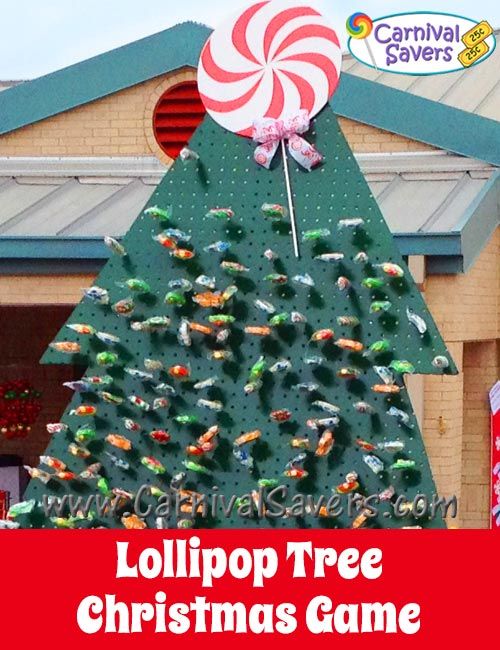 the lollipop tree christmas game is on display in front of a candy store