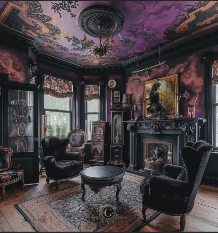 a living room filled with lots of furniture and paintings on the wall above it's fireplace