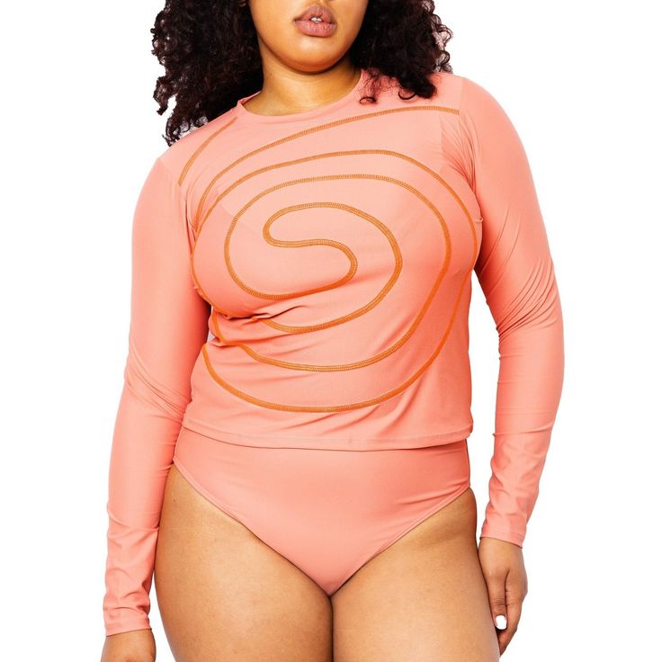 Your search for stylish high-coverage swim is over. MIGA Swimwears Alyssa Spiral Swim Shirt is a unique swim-to-street piece, which features a hand-marked spiral design and has UPF50 to protect your skin during outdoor activity. This rash guard has a close-fitting crew neck and since it is slightly cropped, it pairs well with the Colette High Waisted Bikini Bottoms and the Ally Boy Short. MIGA Swimwear surveyed over 400 women, including members of the disability community, to find their favorit Spring Beachwear Rash Guard For Pool, Fitted Tops For Water Sports In Summer, Fitted Beachwear Tops For Water Sports, Fitted Tops For Water Sports And Beachwear, Stretch Top For Water Sports In Summer, Pink Stretch Rash Guard For Summer, Pink Swimwear For Water Sports In Spring, Fitted Casual Rash Guard For Pool, Fitted Rash Guard For Spring Water Sports