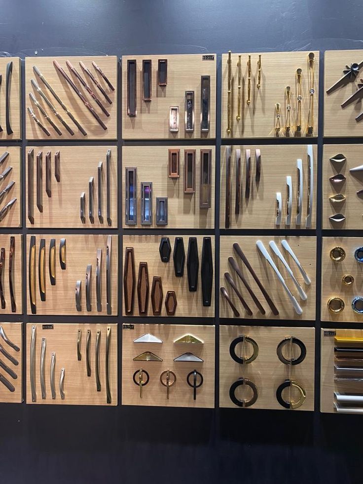 there are many different types of tools on the display wall in front of each other