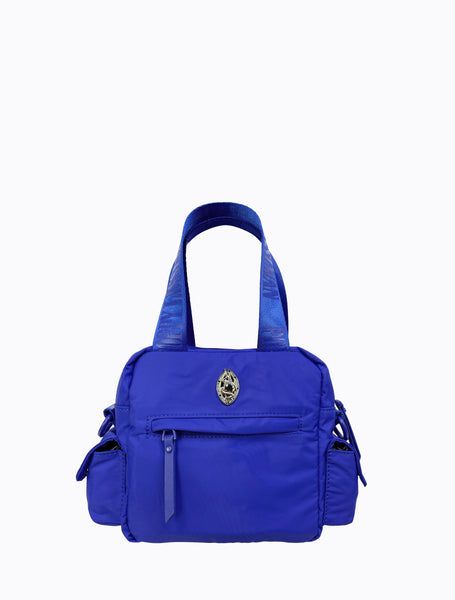 The Block Bag is lined in recycled rPET fabric with matching blue powder-coated hardware, carabiner and faux leather zip pullers. With a short nylon strap and an extra adjustable long nylon strap, this bag provides versatility and can be worn on the arm, or as a cross-body bag. This bag features an internal and external zip pocket, a front two section compartment, and two side compartments to provide added practicality. * rPET fabric is made from recycled post-consumer plastics otherwise destine Blue Bags With Zipper Closure For Streetwear, Functional Blue Nylon Bags, Functional Blue Nylon Shoulder Bag, Blue Nylon Bag With Zipper Pocket, Blue Functional Shoulder Bag With Anti-theft Pocket, Poppy Lissiman, Zip Puller, Belt Jewelry, Cosmetic Pouch