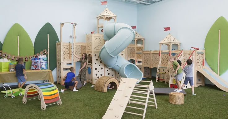 children play area with slide and climbing equipment