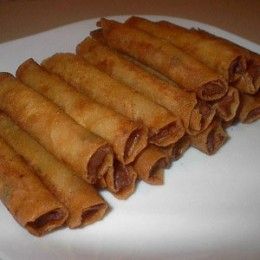 some food is laying on a white plate