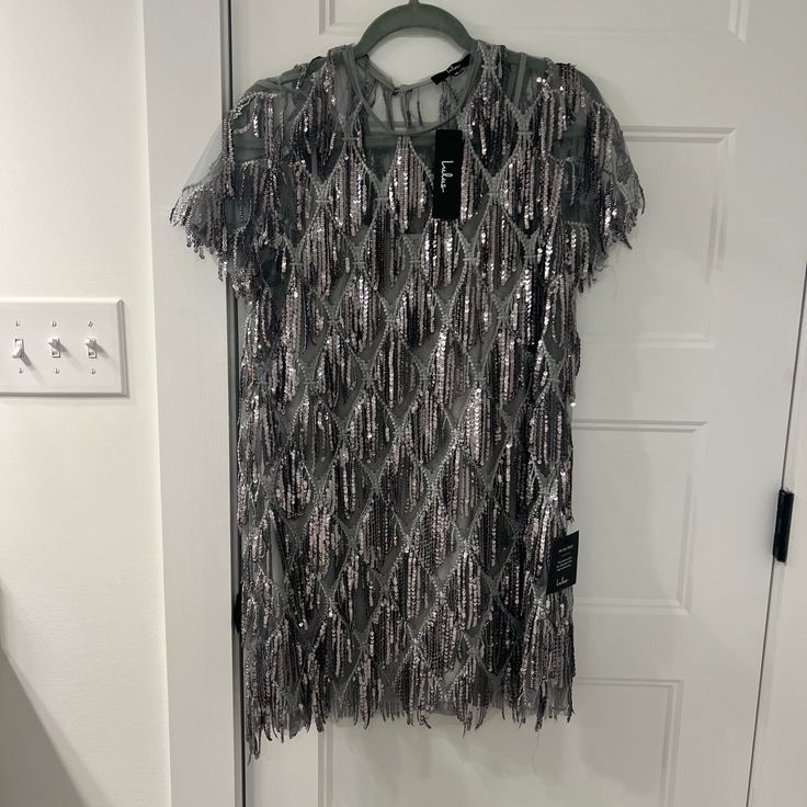 Great For Themed Parties! Tags Still On, Never Worn. Comes With A Gray Slip Dress Attached Underneath Silver Sequined Party Dress, Silver Glamorous Dress For Festive Occasions, Glamorous Silver Dress For Festive Season, Glamorous Silver Dress For Festive Occasions, Silver Sequin Dress With Shimmer For Party Season, Glamorous Silver Sequin Dress For Festive Occasions, Elegant Silver Sequin Dress For Festive Occasions, Silver Festive Dresses For Party Season, Silver Dresses For Party Season