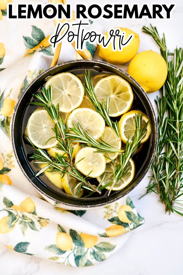 lemon rosemary potpoure in a pan with fresh herbs