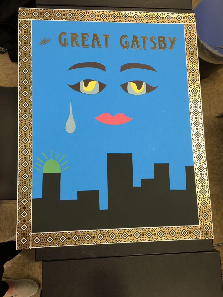 an advertisement for the great gatsby movie is displayed in front of a table