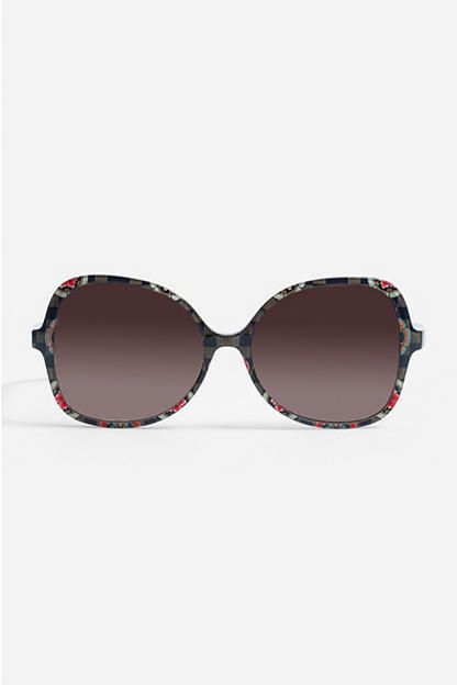 Exuding a retro feel, the Addison Sunglasses are a contemporary take on a glamorous '60s-inspired silhouette. These sunglasses adopt an oversized round shape and boast a sturdy acetate frame complete with tinted lenses and a hypnotic, colorful pattern along both temples. Pair these sunglasses with a beach dress for a feminine summer look or team with denim and knitwear on a sun-filled winter's day. Johnny Was Women's Addison Sunglasses Printed in Taylor Black, Denim Feminine Summer, Boho Chic Outfits, Women's Blouses, Chic Outfit, Embroidered Jeans, Johnny Was, Beach Dress, Eyewear Sunglasses, Summer Looks