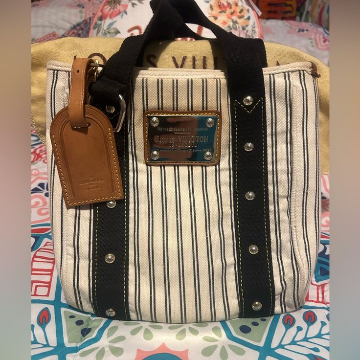 Cute Rare Authentic Canvas Lv Bag With Free Luggage Tag Still In Mint Condition Comes With Dustbag. A Little Color Transfer From The Logo Lining But Can Be Cleaned. Rectangular Canvas Bags With Palladium Hardware, Canvas Bags With Palladium Hardware For Daily Use, Logo Line, Mini Handbag, Mini Handbags, Lv Bag, Luggage Tag, Louis Vuitton Bags, Baby Bag