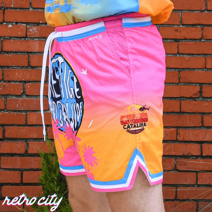 Did we just become new best friends? Yep! Crash the Catalina Wine Mixer in style with these retro mesh shorts. Our Prestige Worldwide shorts are full of color and awesomeness. Features two layers of our buttery-soft, four-way stretch heavyweight retro mesh fabric, deep side pockets, and front drawstring. In-stock and ready to shipShips within 24 hours. Summer Athletic Shorts With Built-in Shorts For Streetwear, Casual Mesh Beach Bottoms, Casual Mesh Bottoms For Beach, Pink Mesh Bottoms For Spring, Retro Streetwear Bottoms With Built-in Shorts, Pink Nylon Athletic Shorts For Summer, Retro Streetwear Shorts For Summer, Retro Summer Streetwear Shorts, Sporty Mesh Athletic Shorts For Summer