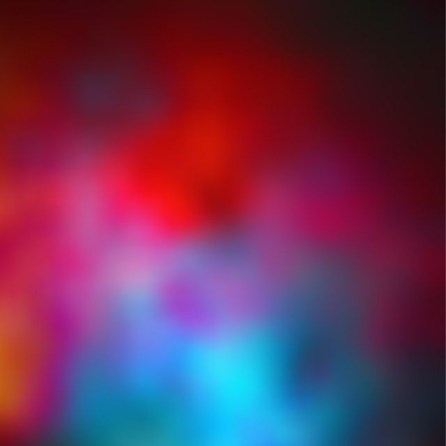 an abstract blurry background with red and blue colors