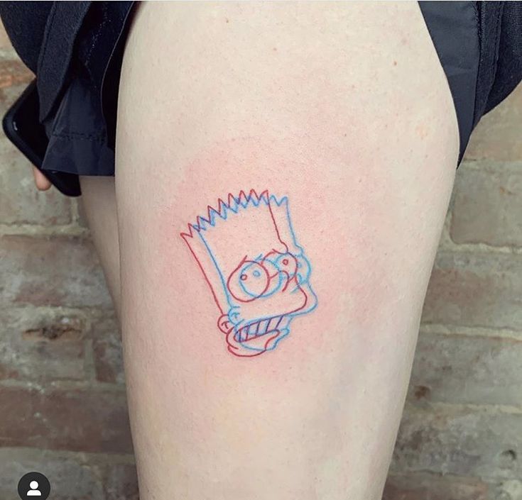 the simpsons tattoo is on someone's thigh and it looks like they have been drawn