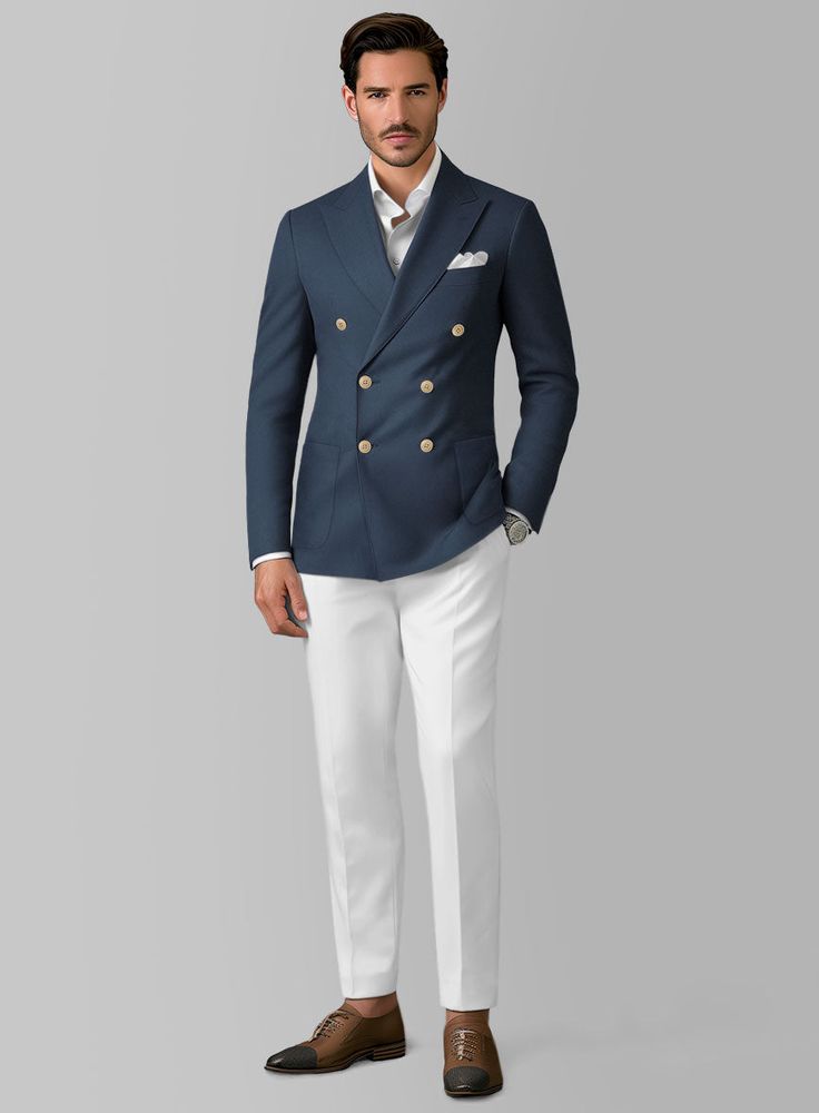 The essence of a gentleman's attire is found in simplicity and sophistication, traits that are beautifully embodied by our White Blue Cotton Suit. This suit is meticulously tailored from a cotton-lycra blend that ensures both comfort and durability. The ensemble features crisp white pants paired with a distinct mid-range blue jacket, offering a stylish and memorable look ideal for making a bold statement. This elegantly designed suit provides the perfect blend of functionality and style, with added stretch to ensure you remain comfortable while looking impeccably sharp in any scenario.  Look Includes    Blue Stretch Chino  Jacket Fabric    White Stretch Chino Pant Fabric   Double Breasted Jacket Style  Peak Lapel   Corozo     Ivory  Buttons  Single Vent  Three Cuff Buttons  Two Welted Back Blue Blazer White Pants Men, White And Blue Suit Men, Mens Suits Style Modern Classy 2024, Wedding Style Men, Double Breasted Suit Men Wedding, White And Blue Suit, White Suit Men, Suit For Men Stylish, Double Breasted Blazer Men