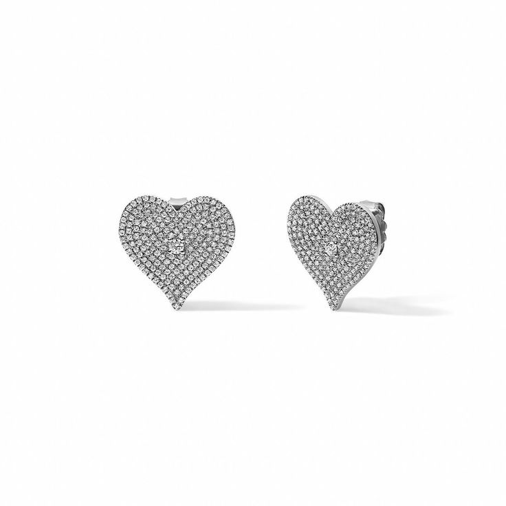 For the romantic soul, the Eternal Hearts embody timeless love with their classic shape and reflects the essence of everlasting connection. These gold and diamond heart studs feature pave diamonds and a sparkling center stone, perfect for adding a touch of sparkle and romance to your look.   Available in 14K Rose Gold Diamond weight = 1.36 carats Stud size = 0.75in This item is FINAL SALE Timeless Love, Soft Toothbrush, Heart Studs, Rose Gold Diamonds, Diamond Heart, Semi Precious Gemstones, Pave Diamonds, Gold Diamond, Semi Precious