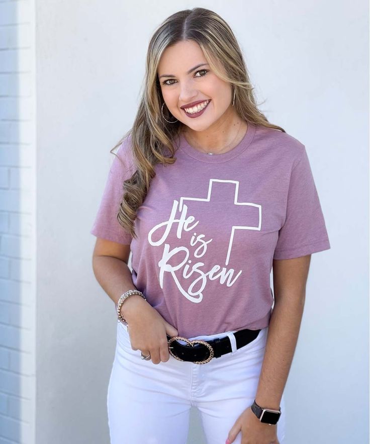 He is RISEN!! The tomb is EMPTY! Easter is a time we celebrate the resurrection of our Lord and Savior! What a better way to represent it than with this Monogrammed He Is Risen Cross Tee* It is perfect for any Easter gathering!  * Alternate Heather CVC/Blend colors are 52/48 airlume combed and ringspun cotton/polyester * Side seams, retail fit * Shoulder to shoulder taping * Unisex sizing Inspirational Crew Neck Tops For Spring, Inspirational Short Sleeve Tops For Spring, The Tomb Is Empty, He Is Risen Cross, Easter Gathering, Cross Shirts, The Resurrection, He Is Risen, Easter Shirt