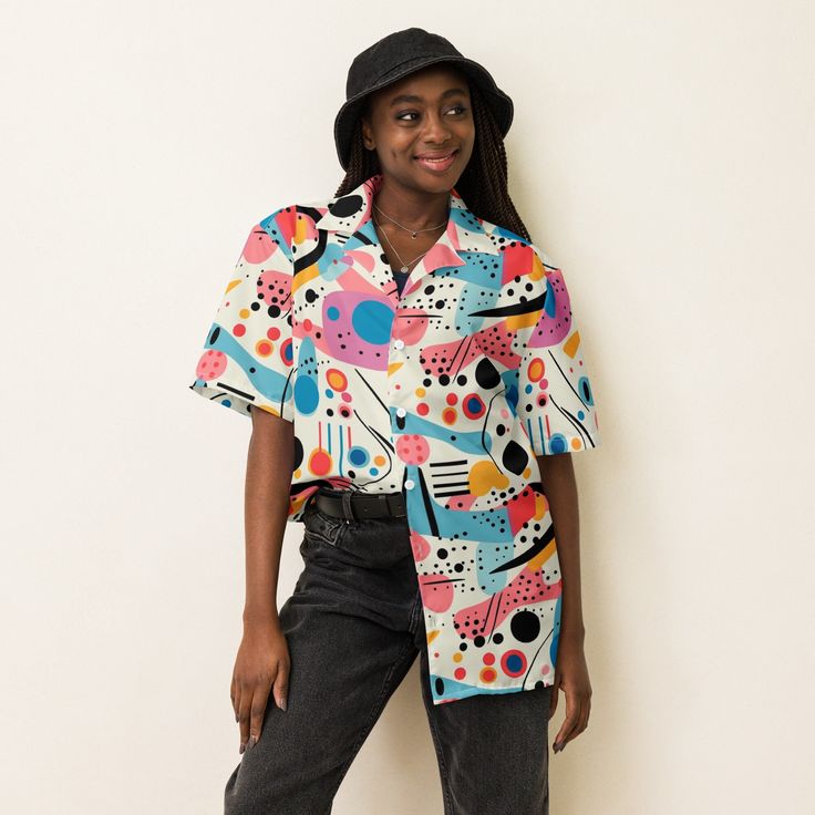 Meet your new favorite summer shirt! It exudes coolness both in terms of style and material. Plus, its featherlight and moisture-wicking material ensures comfort even on the hottest days. * 65% recycled polyester, 35% polyester * Fabric weight: 2.95 oz/yd² (100 g/m²) * Breathable and moisture-wicking material * Oversized fit * UPF50+ protection * Blank product components sourced from China This product is made especially for you as soon as you place an order, which is why it takes us a bit longe Trendy Printed Camp Shirt For Spring, Trendy Button-up Short Sleeve Shirt For Summer, Trendy Collared Camp Shirt For Summer, Modern Graphic Print Shirt For Summer, Trendy Printed Short Sleeve Shirt For Spring, Modern Graphic Print Summer Shirt, Trendy Printed Short Sleeve Shirt For Summer, Retro Button-up Summer Shirt, Retro Button-up Shirt For Summer