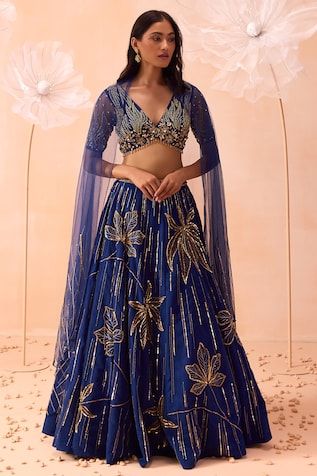 Blue lehenga with cutdana, sequin, bead embroidery in floral stripe pattern. Paired with sleeveless embroidered blouse and dupatta. - Aza Fashions Lehenga Designs Blue Colour, Lehenga Designs Sangeet, Sabyasachi Floral Lehenga, Floral Lehenga Blouse Designs, Lehenga Simple Elegant, Wedding Lehenga Simple, Sangeeth Dress Designs, Blue Traditional Outfit, Ladies Lehenga