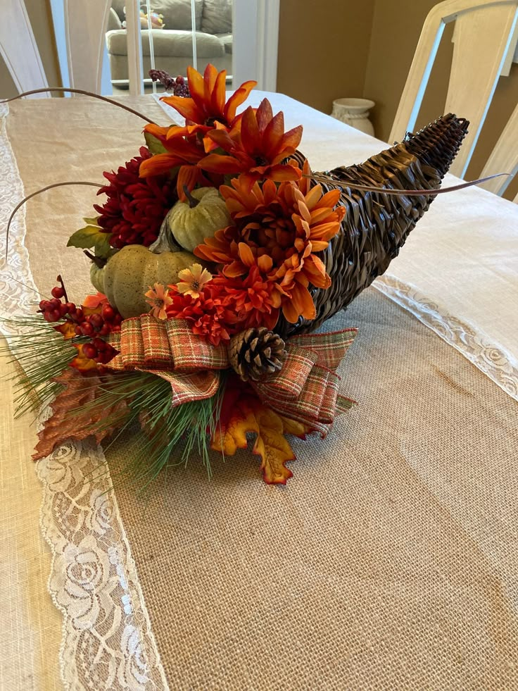 a decorative bird sitting on top of a table