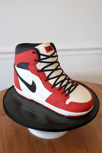 a cake shaped like a shoe on top of a table