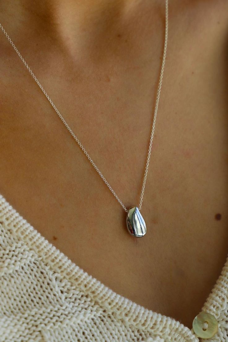 This silver raindrop necklace is sure to make a splash and bring a playful touch to your look. Sterling silver chain with, rhodium plate brass 18" with 2" extender Roman Bracelet, Teardrop Necklace, Mink Pink, Rain Drops, Star Necklace, Sterling Silver Chain, Hat Hairstyles, Shoe Sale, Ring Bracelet