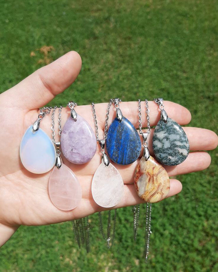 🌿Welcome and greetings friend🌿  For our latest treasure finds and new crystal arrivals, follow us @abundantsoulcrystals on Instagram  🌿 This listing is for ONE crystal drop necklace similar to photo. Each piece has color variation but all are lovely. Available in rose quartz, opalite, clear quartz, lapis lazuli, moss agate, crazy lace agate and lepidolite. Please use drop-down menu to make desired selection.  🌿 Measurements are approximate:  22 inch silver plated chain 2 inch pendant Please remove when swimming or bathing Super Cute! 🌿 Kindly double check the address you have listed for delivery as that is the one I use for shipping. If your address has changed please send me a message with your order and I will update. I can not ship a replacement item or issue refunds for incorrect Teardrop Gemstone Necklaces For Healing, Teardrop Natural Stones Healing Necklace, Teardrop Natural Stone Healing Necklace, Teardrop Natural Stones Healing Necklaces, Healing Natural Stone Teardrop Pendant Necklace, Drop Necklace With Natural Stones For Jewelry Making, Natural Stones Drop Necklace For Jewelry Making, Spiritual Gemstone Teardrop Pendant Crystal Necklaces, Spiritual Teardrop Gemstone Crystal Necklace