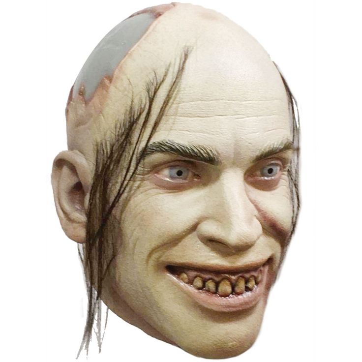 a man wearing a creepy mask with hair on his head and teeth missing the upper part