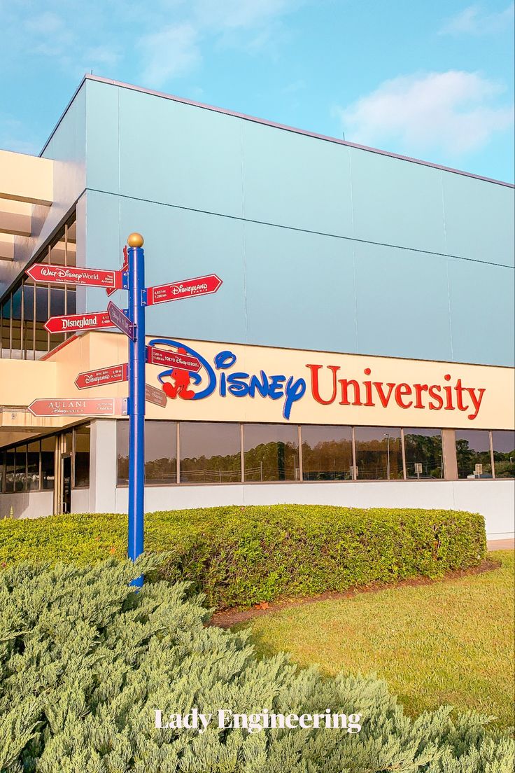 there is a sign that says disney university in front of the building