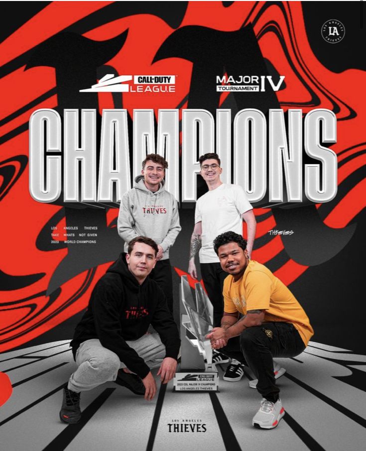 three men pose for a photo with the trophy in front of an orange and black background