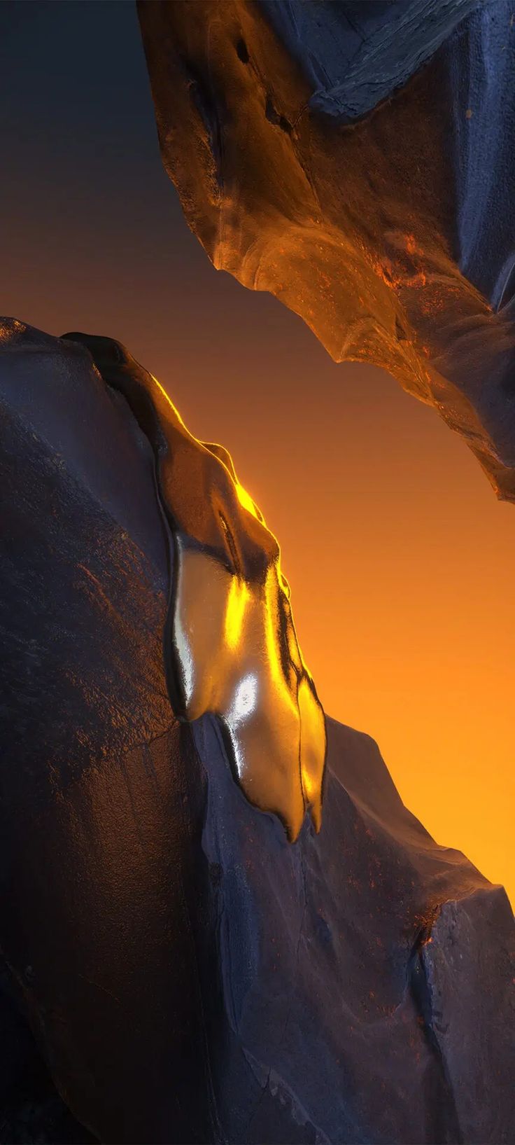 the sun is shining on some rocks in the desert at sunset or sunrise, and it looks like something out of space