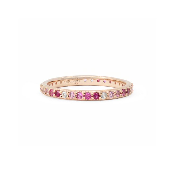 Indulge in timeless elegance with our Multi Colored 14k Gold Eternity Band—a luxurious masterpiece that transcends the boundaries of conventional jewelry. This exquisite eternity band is a manifestation of everlasting moments, symbolizing the perpetuity of love and commitment.Crafted with precision and adorned with a total of .85 carats of semi-precious and precious gemstones, each stone is meticulously set deep within the slender band. The result is a seamless and harmonious blend of colors, cr Elegant Yellow Gold Sapphire Eternity Band, Elegant Sapphire Stackable Eternity Band, Pink Sapphire Halo Jewelry With Round Cut, Elegant Sapphire Eternity Band, Elegant Multi-stone Pink Sapphire Jewelry, Rose Gold Multi-stone Pink Sapphire Jewelry, Elegant Pink Sapphire Multi-stone Jewelry, Elegant 14k Gold Multi-stone Eternity Band, Rose Gold Multi-stone Jewelry With Pink Sapphire