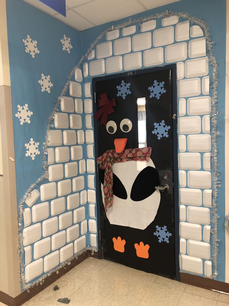 a door decorated to look like a snowman