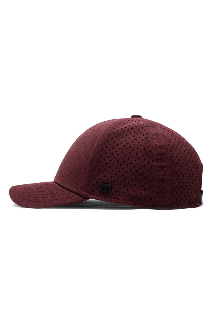 a maroon hat with holes on the front and side, sitting against a white background