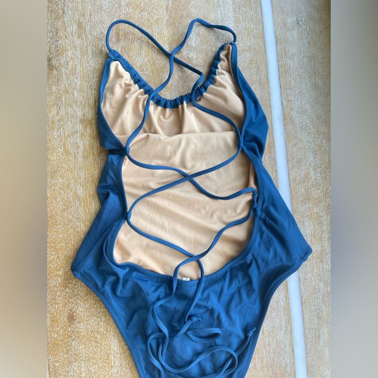 Brand: J Crew Style: Playa Rockaway Ruched Halter Top One Piece Bikini Swim Suit Blue Condition: New With Out Tags (Never Worn Other Then Trying On) Size: Xs Color: Blue Cross-tied Swimwear For Beach Season, Beach Season Cross-tied Swimwear, Cross-tied Swimwear For The Beach, Sleeveless Cross-tied Swimwear For Vacation, Cross-tied Beachwear Swimwear, Blue Nylon Tankini For Vacation, Beachwear Cross-tied Swimwear For Vacation, Cross-tied Beachwear Swimwear For Vacation, Cross-tied Beachwear Swimwear For Pool