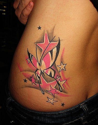 a woman's stomach with tattoos on it and stars around the belly, in pink