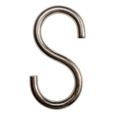 the letter s is made out of metal and has a rounded shape with an irregular edge