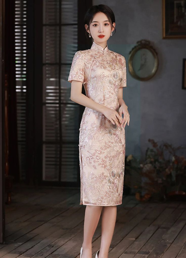 Elegant Pink Ao Dai With Floral Embroidery, Fitted Floral Embroidered Cheongsam For Party, Fitted Floral Embroidery Cheongsam For Party, Elegant Pink Dress With Stand Collar, Embroidered Cheongsam For Formal Occasions, Formal Fitted Pink Cheongsam, Fitted Floral Embroidery Cheongsam, Pink Cheongsam For Spring Party, Fitted Pink Dress With Stand Collar