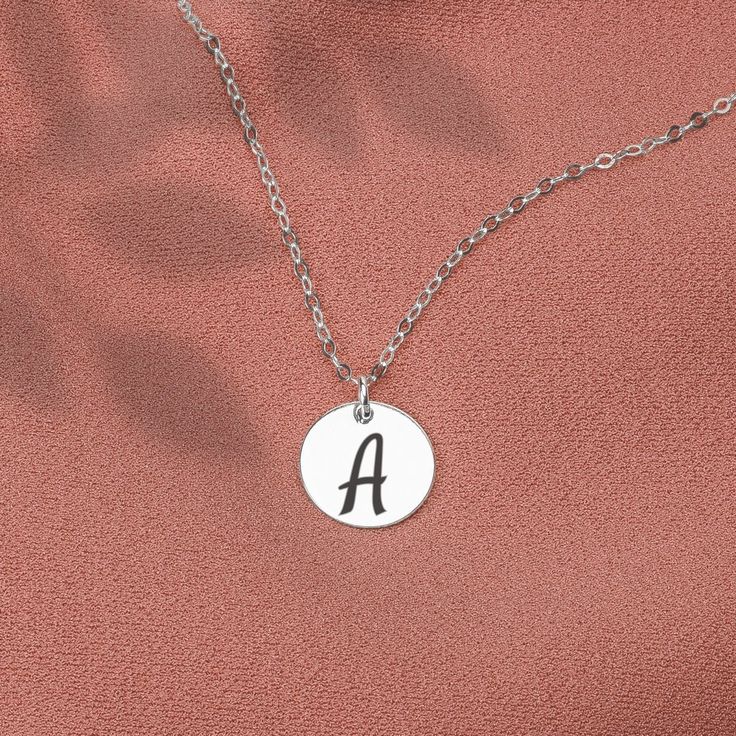 The Custom Initial Disc Necklace is the perfect way to show off your unique style and personality. This beautiful, personalized necklace offers you the opportunity to create something absolutely unique and meaningful! Choose from one to six discs crafted from our three different metal choices: silver, gold, and rose gold. Each disc can be custom engraved with an initial of your choice, or select any symbol from our curated list. The necklace also comes in three different lengths so you can find Initial Disc Necklace, Custom Initials, Disc Necklace, Create Something, Personalized Necklace, Custom Engraving, Gold Filled, Silver Gold, Unique Style