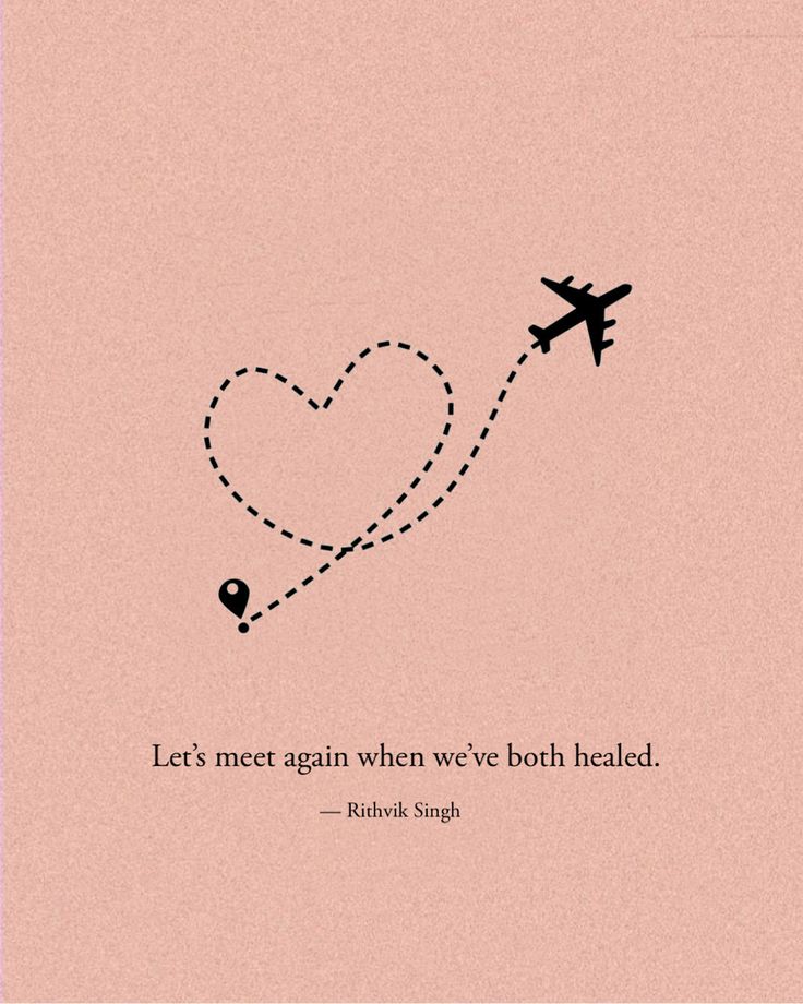 an airplane is flying in the sky with a heart