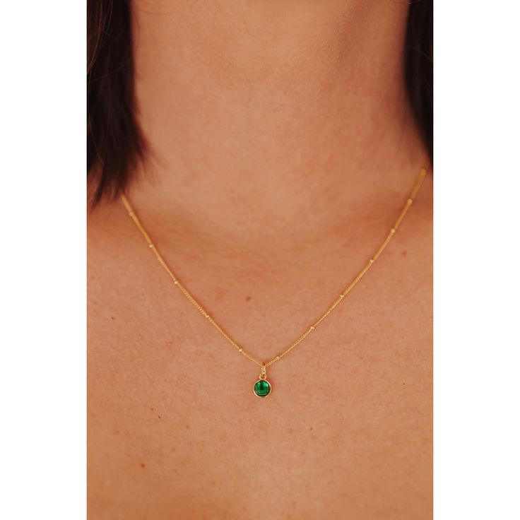 Our dainty Emerald birthstone necklace is part of our new Birthstone Necklace Collection! This beautiful, yet delicate necklace is made with top-quality chain, hardware, and stone. This custom May birthstone necklace is the perfect way to add a small amount of color and meaning to your every day look. Features: Available in 18k gold plated Sterling Silver 15.5" satellite chain + 2 inch extender (17.5 inch total length) Custom Emerald crystal Lobster claw closure Dainty Everyday Birthstone Pendant Necklace, Dainty Everyday Birthstone Necklace With Delicate Chain, Dainty Gemstone Charm Necklace For May Birthstone, Everyday May Birthstone Pendant Necklace, Everyday Emerald Necklace For May Birthstone, Everyday Delicate May Birthstone Necklace, Everyday Solitaire Pendant Necklace With Birthstone, Everyday Green Charm Necklace, Dainty Heart Pendant Necklace For May Birthstone