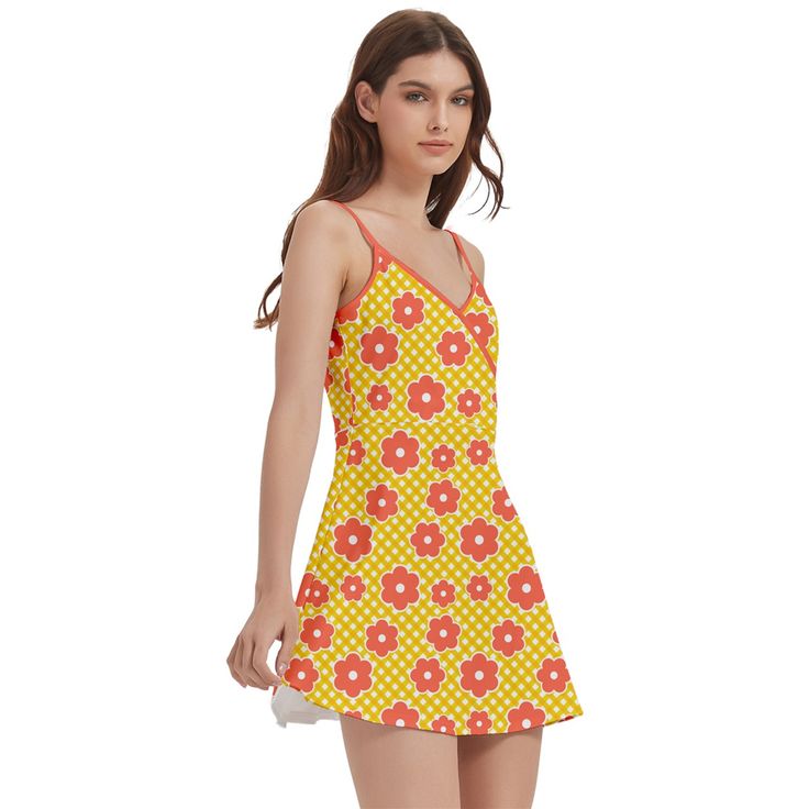 Yellow Orange Floral Dress: Eye-catching retro-inspired piece featuring a vibrant mod floral pattern in sunny yellow and bold orange hues Spaghetti Strap Mini Dress: Delicate straps offer a feminine touch, perfect for showcasing sun-kissed shoulders and embracing the 60s mod aesthetic Mod Floral Dress: Fun and lively 60s-inspired floral print captures the essence of mod fashion, making a playful statement wherever you go Retro Inspired Dress: Channels the spirit of 1960s fashion with a contempor Orange Sundress With Adjustable Straps For Spring, Yellow Mini Dress With Adjustable Straps, Yellow Sleeveless Mini Dress With Adjustable Straps, Yellow Spring Dress With Retro Print, Fitted Yellow Sundress With Adjustable Straps, Summer Mod Beach Dresses, Yellow Dress With Retro Print For Spring, Orange Retro Print Summer Dress, Mod Summer Beach Dresses